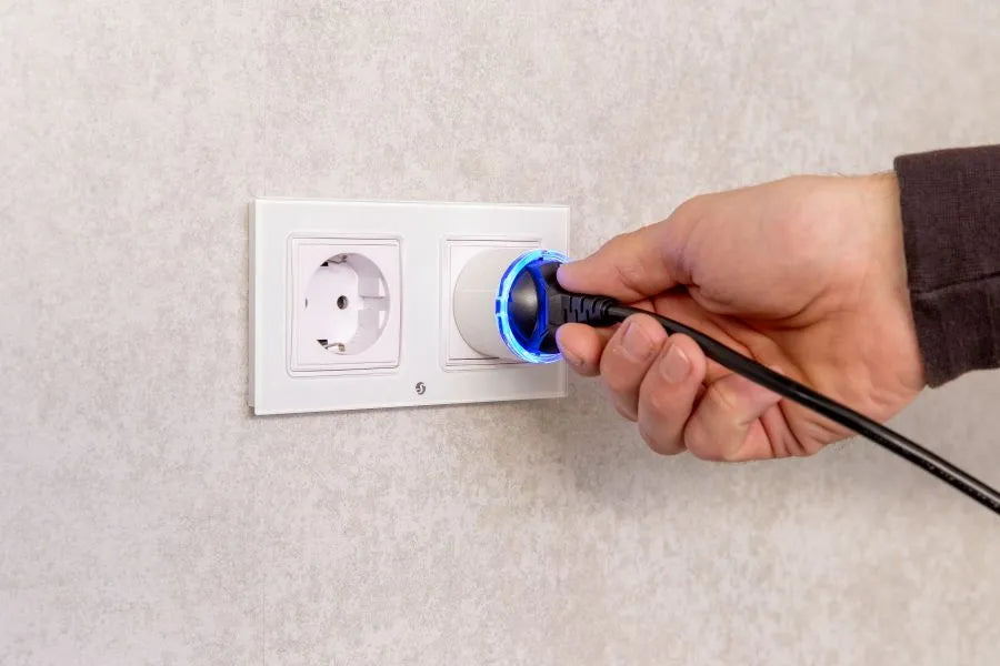 Shelly Plug S Gen3 in a wall socket; makes small saunas up to 2500 watts smart and remotely controllable