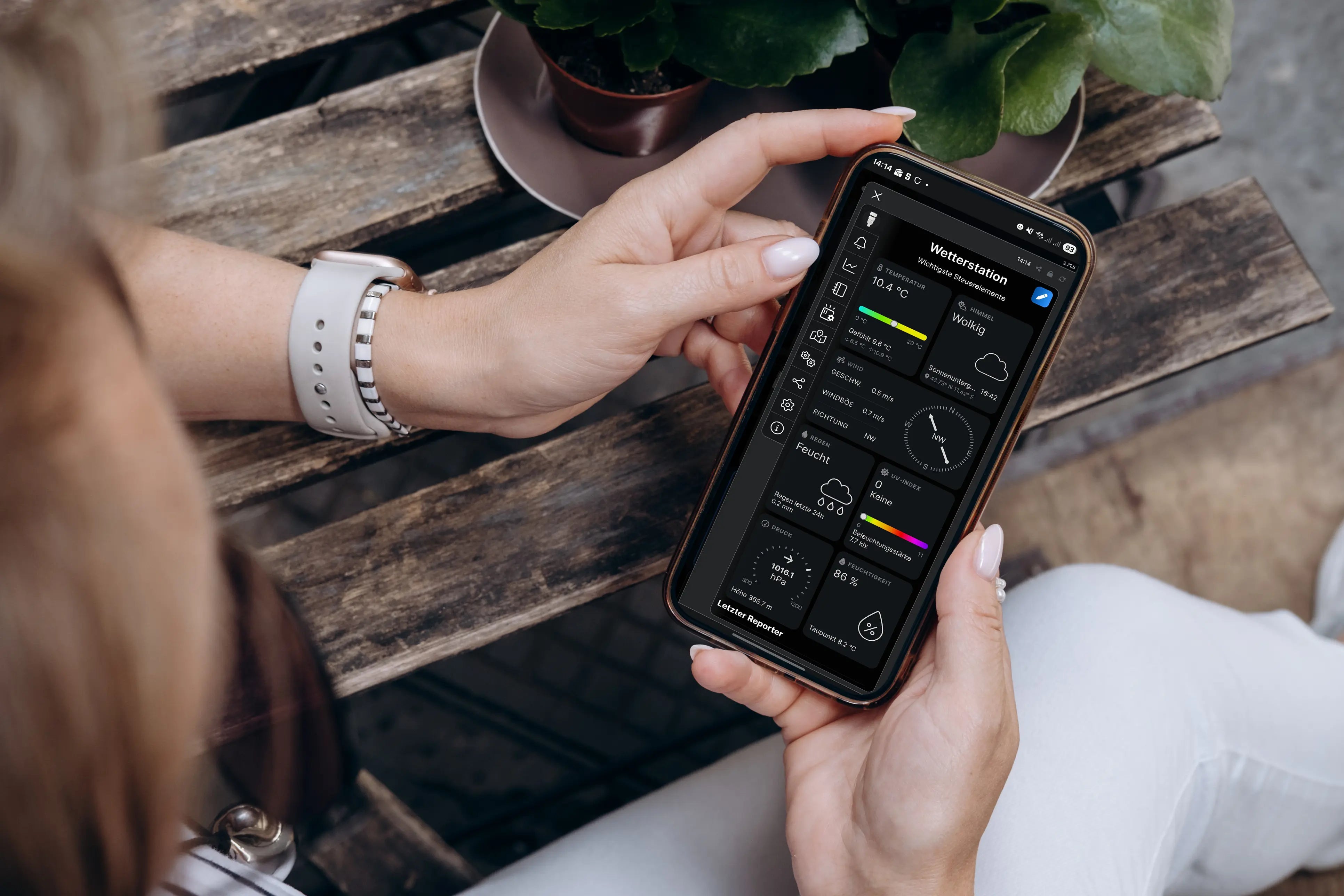 woman with smartphone and Shelly app; control the awning by app and set up automations