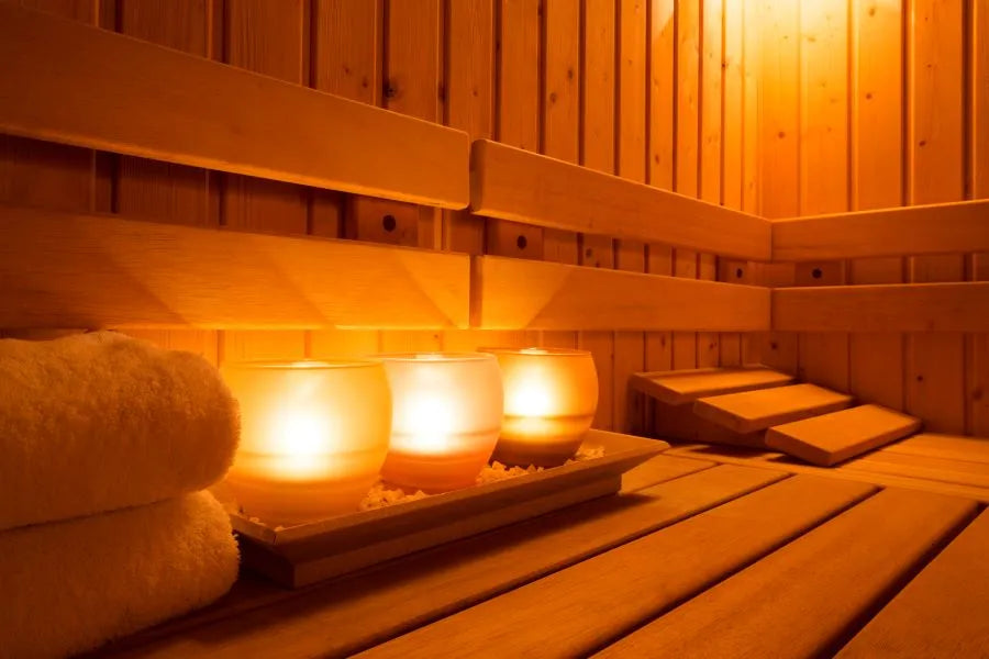 three lights in a sauna; smart lighting adapts brightness and color to temperature and mood