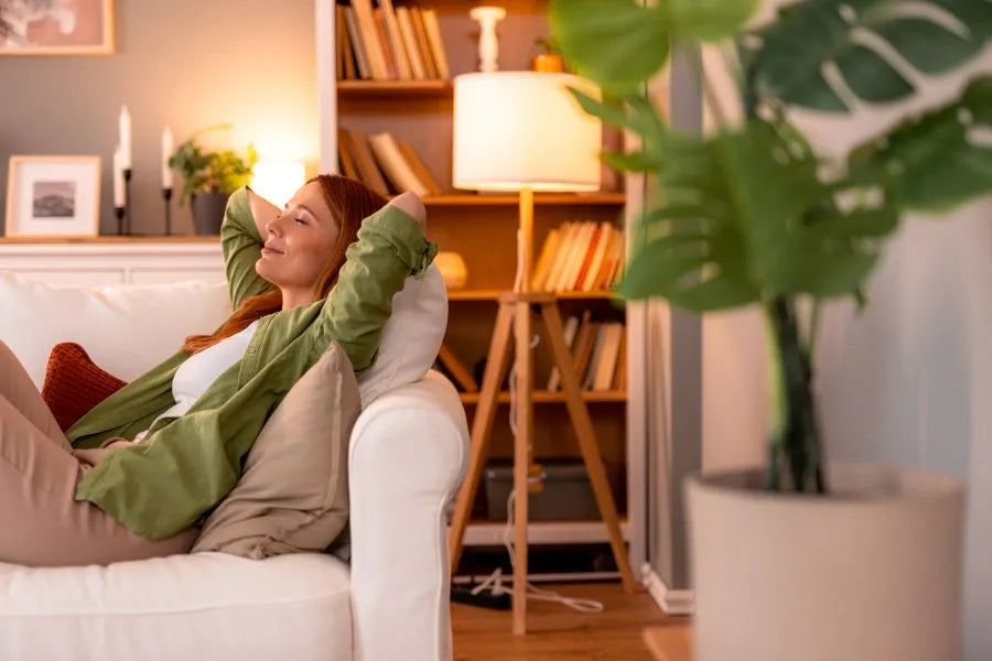 Relaxed woman in the living room - easy retrofit without structural alterations. 